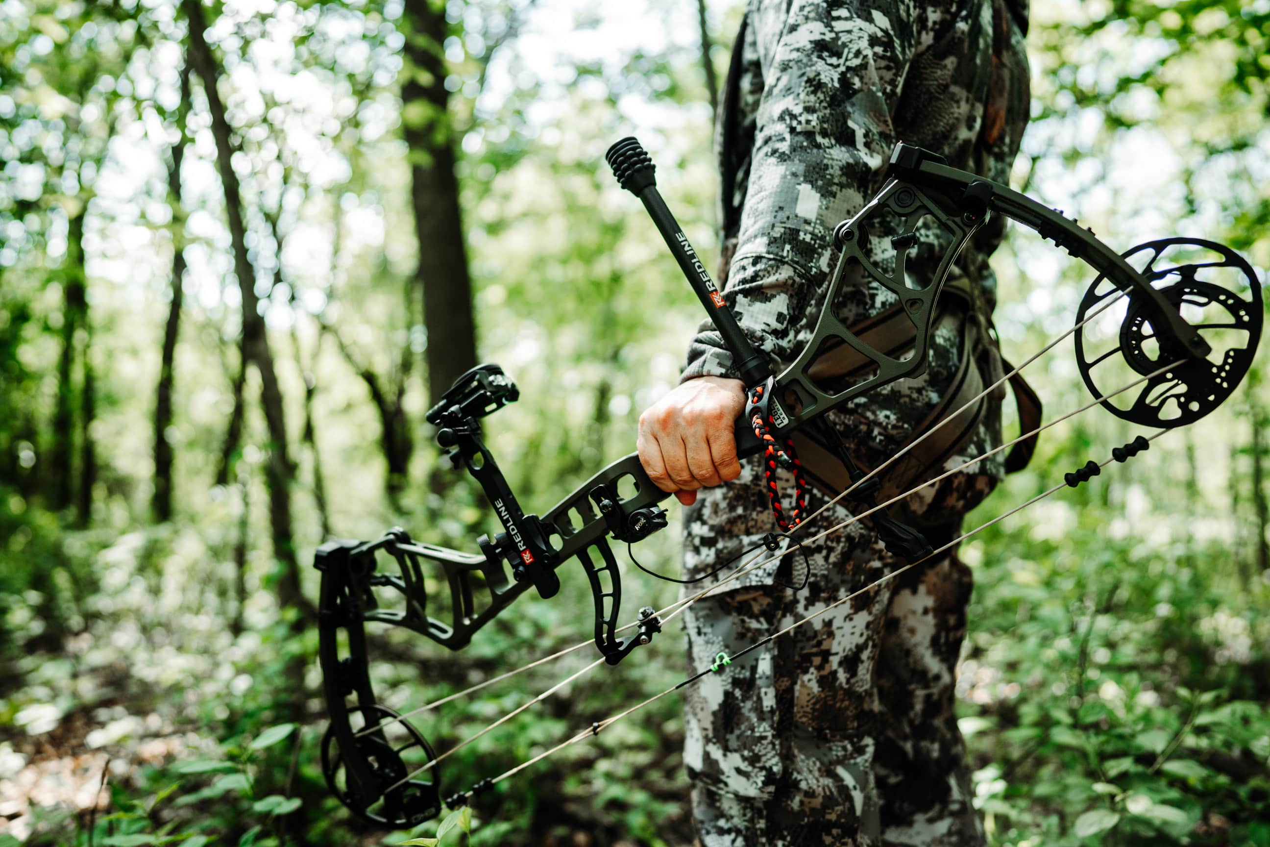 Bowhunter holding Bear Refine EKO